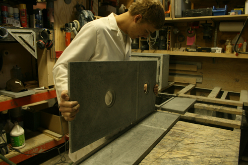 Greg Seuren putting the bottom on a soapstone sink
